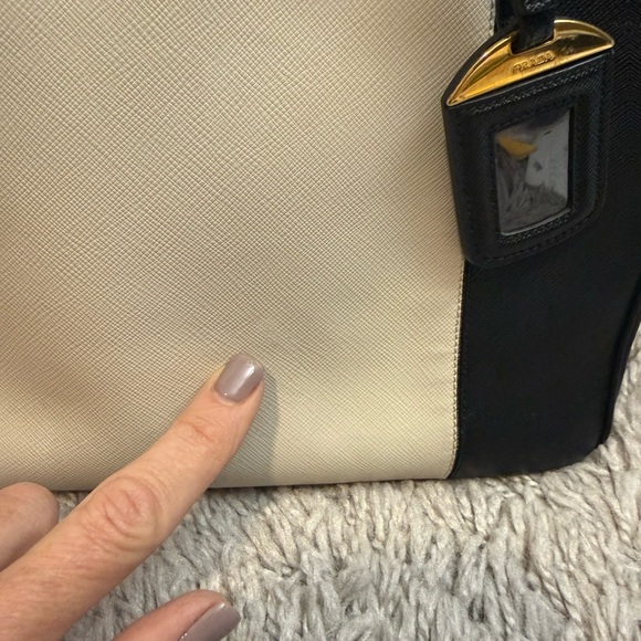 Prada Black and Cream Satchel
Saffiano Leather
Beautiful Handbag - Picture 8 of 12